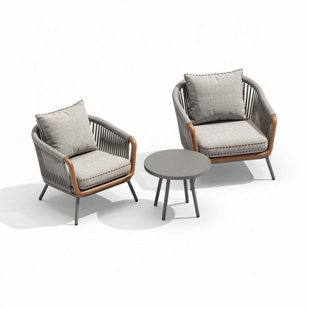 Outdoor rope lounge chair set with gray cushions and round side table